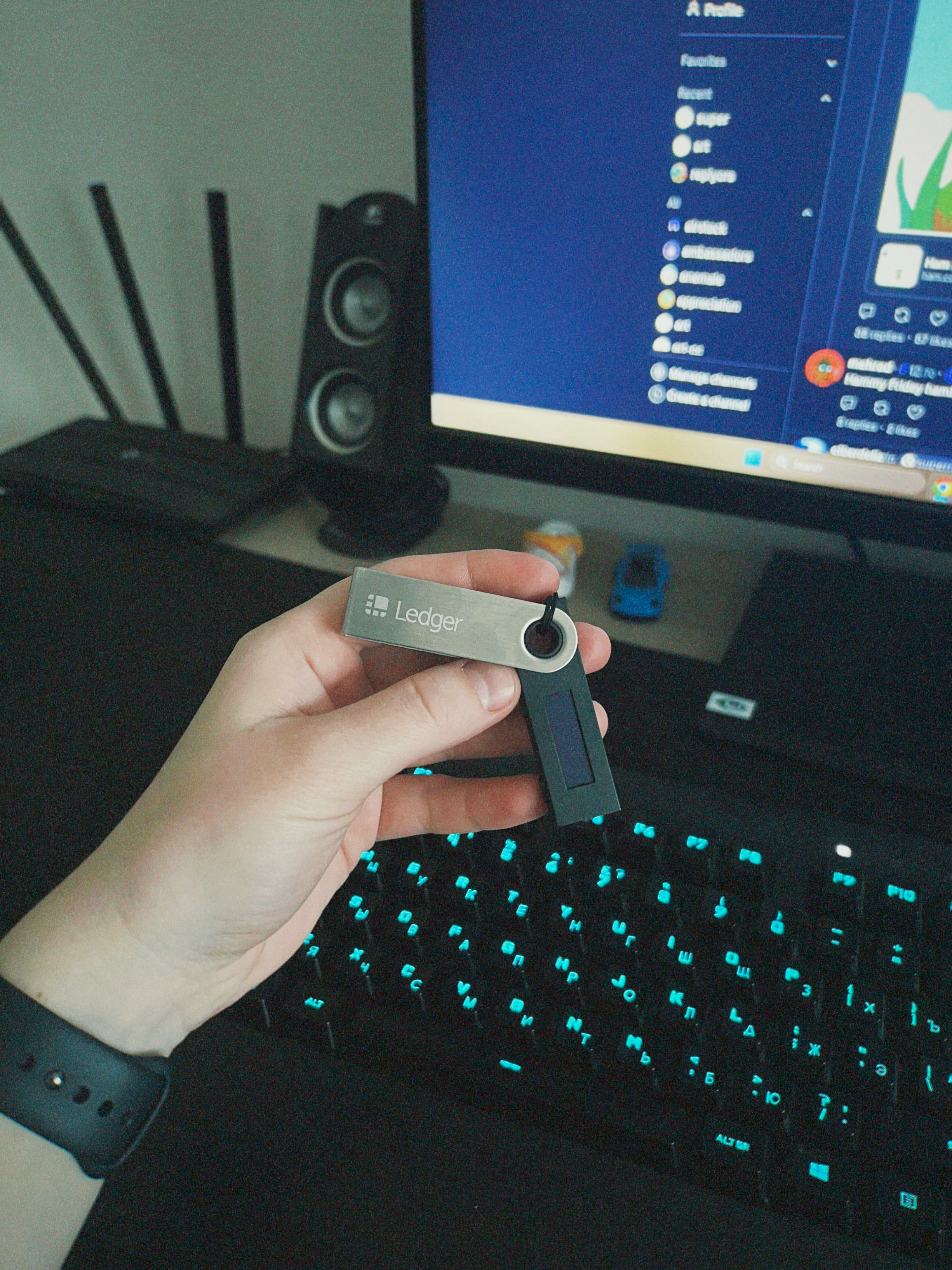 Hardware wallet and keyboard representing digital asset security